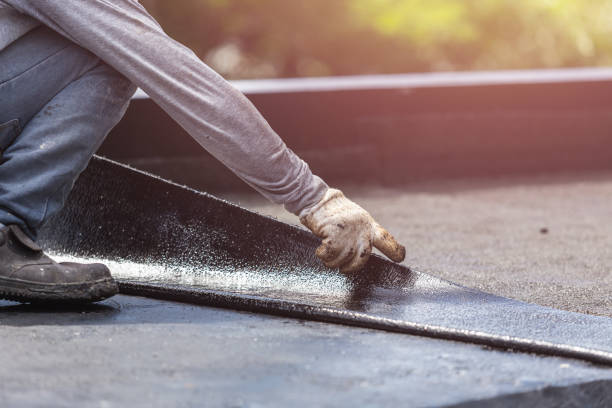 Professional Basement Waterproofing technician working in Lambertville, NJ